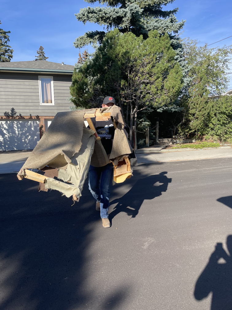 image of moving company employees loading a truck